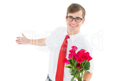 Geeky hipster offering bunch of roses