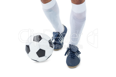 Football player kicking the ball