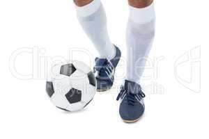 Football player kicking the ball