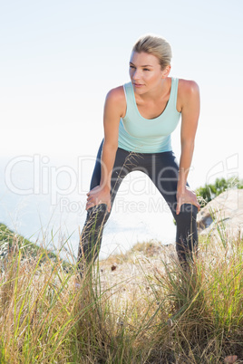 Fit blonde taking a break at summit