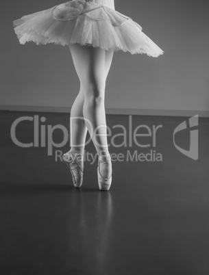 Graceful ballerina standing en pointe