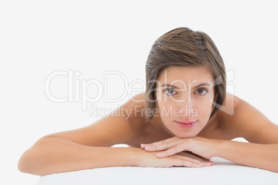 Close up portrait of a beautiful woman on massage table