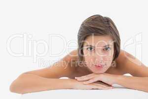 Close up portrait of a beautiful woman on massage table
