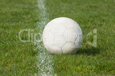 Football on an empty pitch