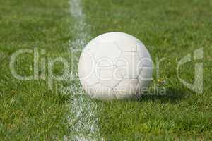 Football on an empty pitch