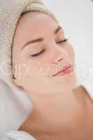 Beautiful woman relaxing in towel turban