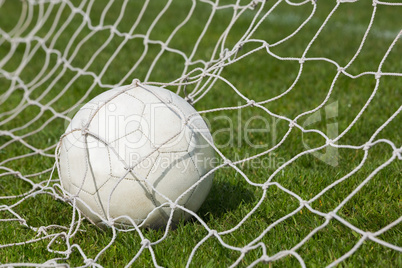 Football at the back of the net