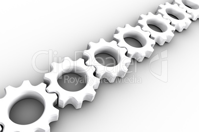 White cogs and wheels connecting