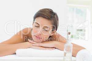 Close up of a beautiful young woman on massage table