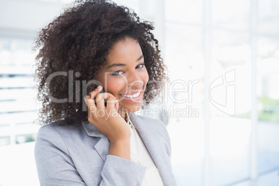 Casual businesswoman talking on phone