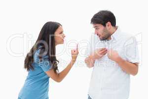 Angry brunette shouting at boyfriend