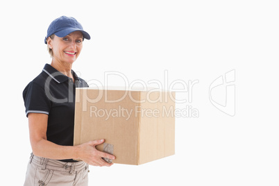 Happy delivery woman holding cardboard box