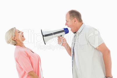 Man shouting at his partner through megaphone