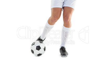 Football player kicking the ball