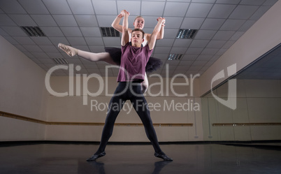 Ballet partners dancing gracefully together