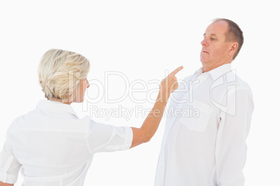 Angry older couple arguing with each other