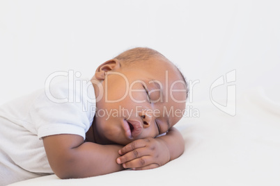 Adorable baby boy sleeping peacefully