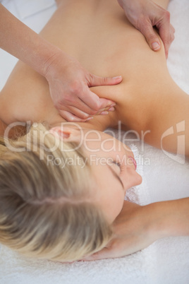 Pretty blonde enjoying a massage