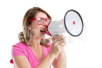 Close up of young woman shouting into bullhorn