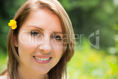 Cute young woman in field