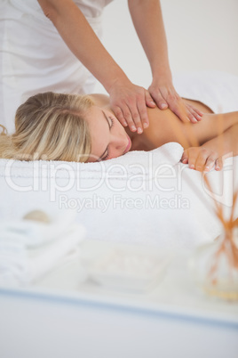 Pretty blonde enjoying a massage