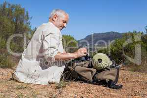 Hiker taking a break on country trail