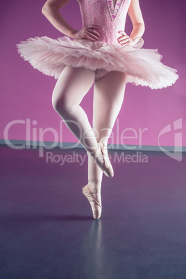 Graceful ballerina dancing en pointe
