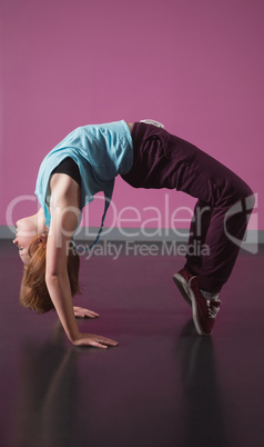 Pretty break dancer doing a back bend