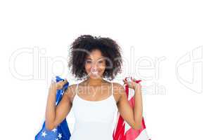Pretty girl in white top holding american flag