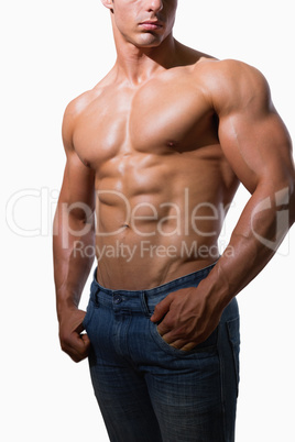 Mid section of a shirtless muscular man