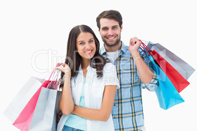 Attractive young couple with shopping bags