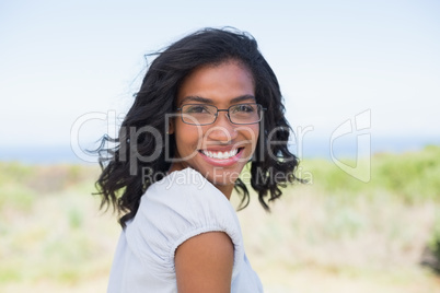 Casual pretty woman smiling at camera