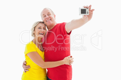 Happy mature couple taking a selfie together