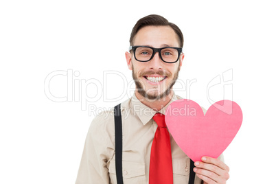 Geeky hipster smiling and holding heart card