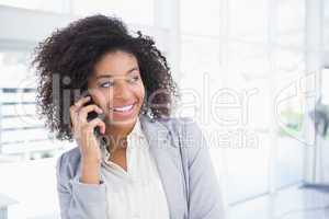 Casual businesswoman talking on phone