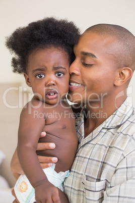 Happy father with his baby girl