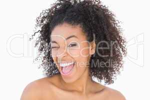 Pretty girl with afro hairstyle smiling at camera