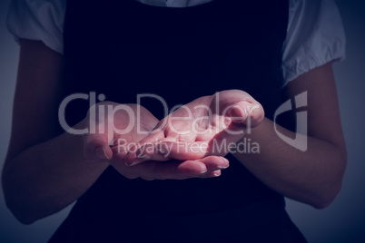 Businesswoman presenting your product with hands