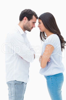 Angry couple facing off after argument