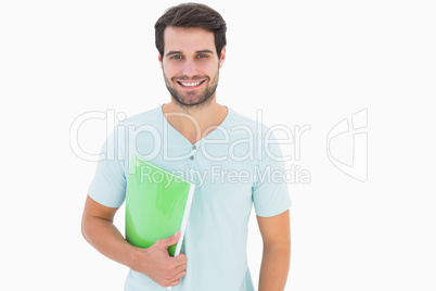 Handsome student smiling at camera