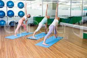 Yoga class in fitness studio