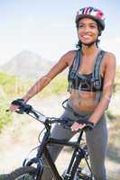 Fit woman going for bike ride