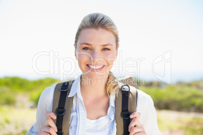 Attractive hiking blonde smiling at camera