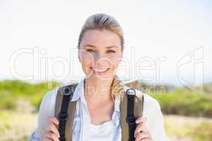 Attractive hiking blonde smiling at camera