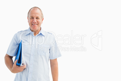 Happy mature student holding folder