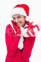 Beautiful festive woman holding gift
