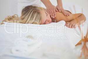 Pretty blonde enjoying a massage