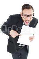 Geeky smiling businessman showing paper