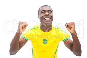 Happy brazilian football fan cheering