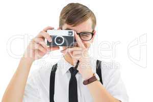 Geeky hipster holding a retro camera